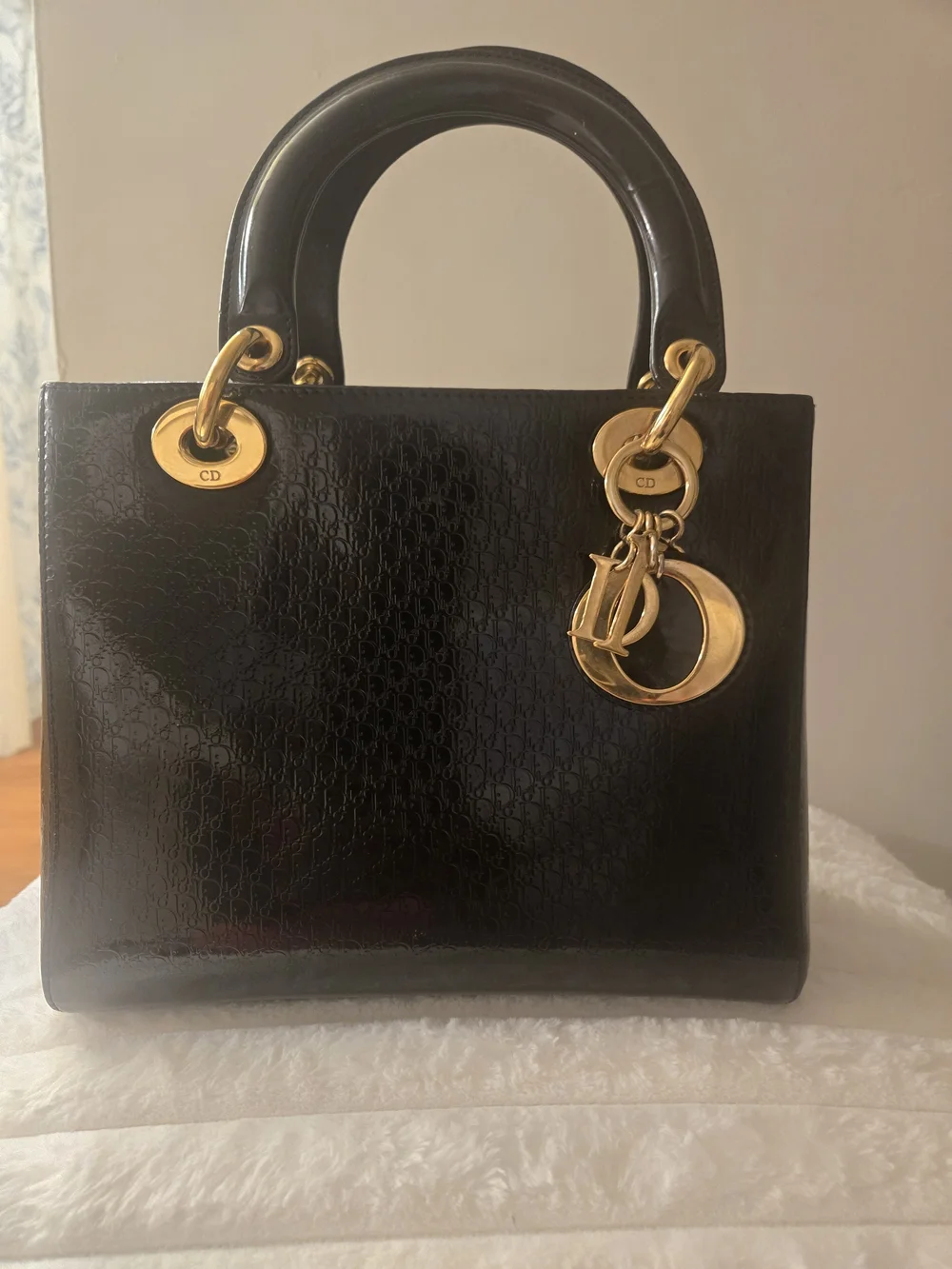 Black Structured Patent Leather Top-Handle Bag with Gold Hardware